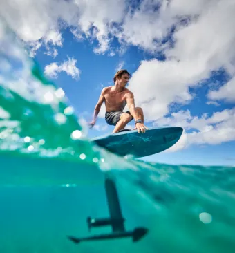 Rider gliding over the ocean during a thrilling Bali Efoil Surfing adventure.
