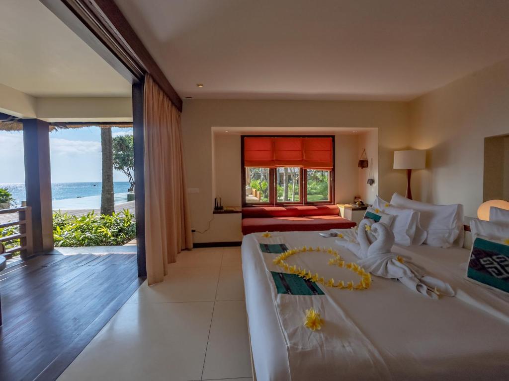 Qunci Villas Lombok Booking: Luxury pool villas with ocean views.